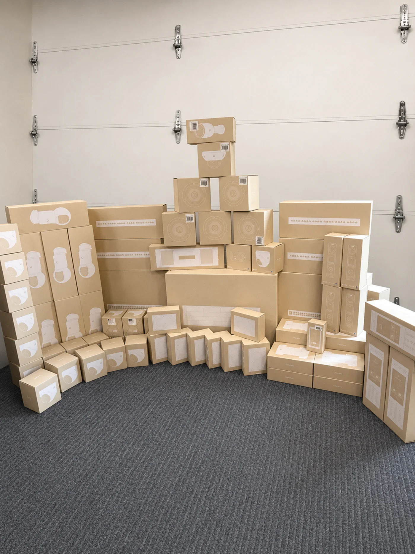 UniFi cameras, door hubs, readers, and switches staged for a place-of-worship installation